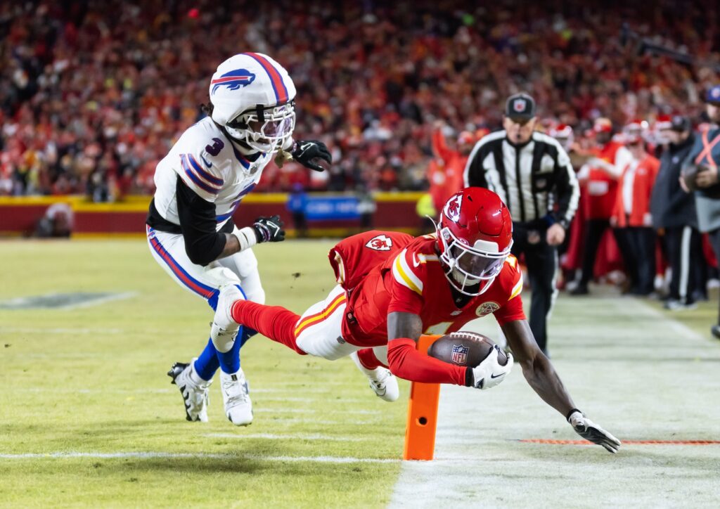 Kansas City Chiefs wide receiver Xavier Worthy (1) dives into the end zone to score a touchdown against the Buffalo Bills in the AFC Championship game at GEHA Field.