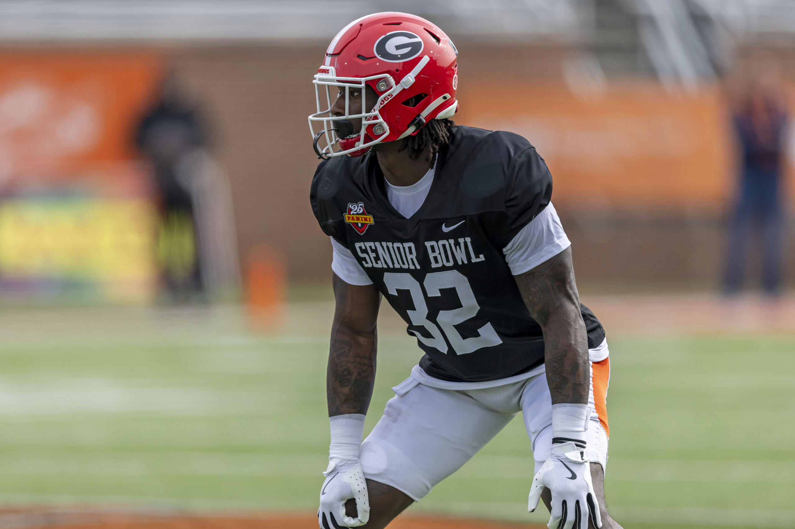 American team linebacker Smael Mondon Jr. of Georgia (32) lines up during Senior Bowl practice for the American team at Hancock Whitney Stadium.