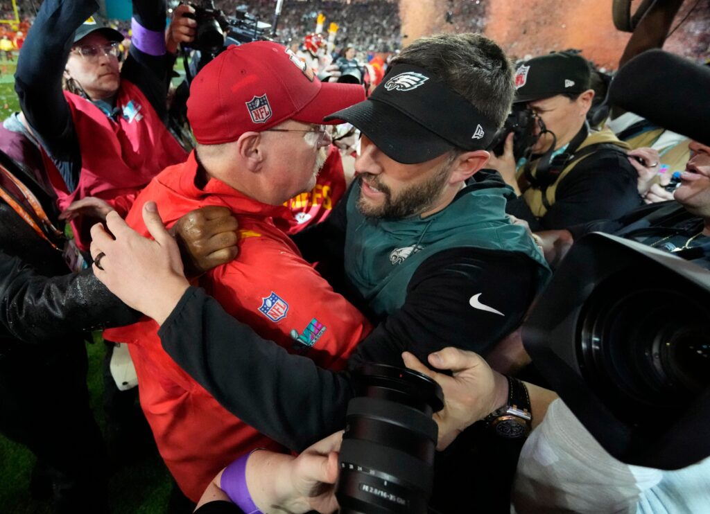 Kansas City Chiefs head coach Andy Reid and Philadelphia Eagles head coach Nick Sirianni greet each other after Super Bowl LVII at State Farm Stadium.