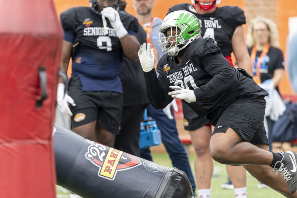 National team defensive lineman Jamaree Caldwell of Oregon (90) works through drills during Senior Bowl practice for the National team at Hancock Whitney Stadium.