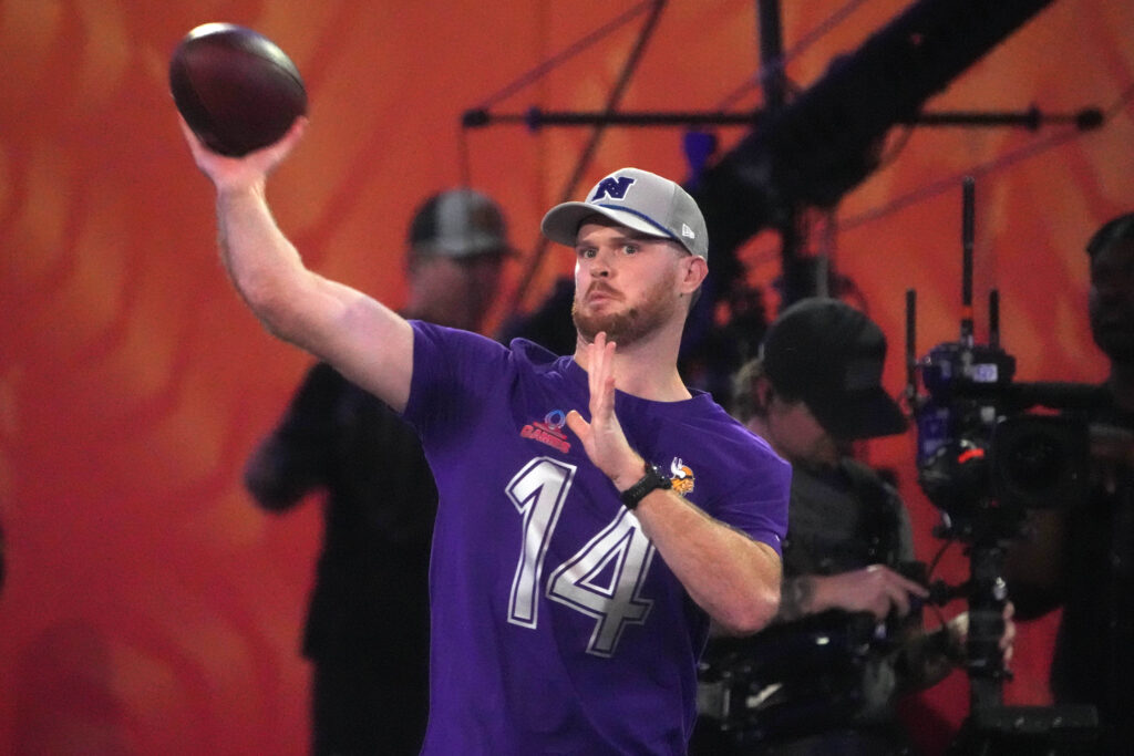 Sam Darnold (14) throws the ball in the Passing the Test event during the Pro Bowl Skills Challenge at Nicholson Fieldhouse.