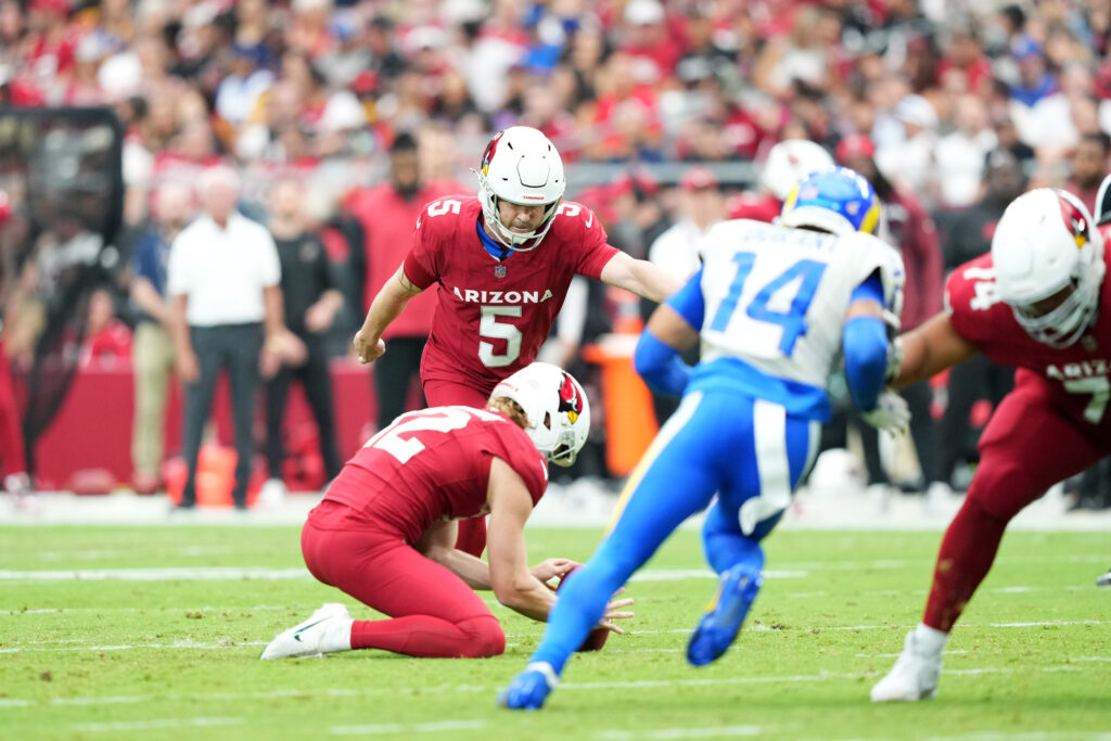 Arizona Cardinals place kicker Matt Prater (5) kicks a field goal against the Los Angeles Rams during the first half at State Farm Stadium.